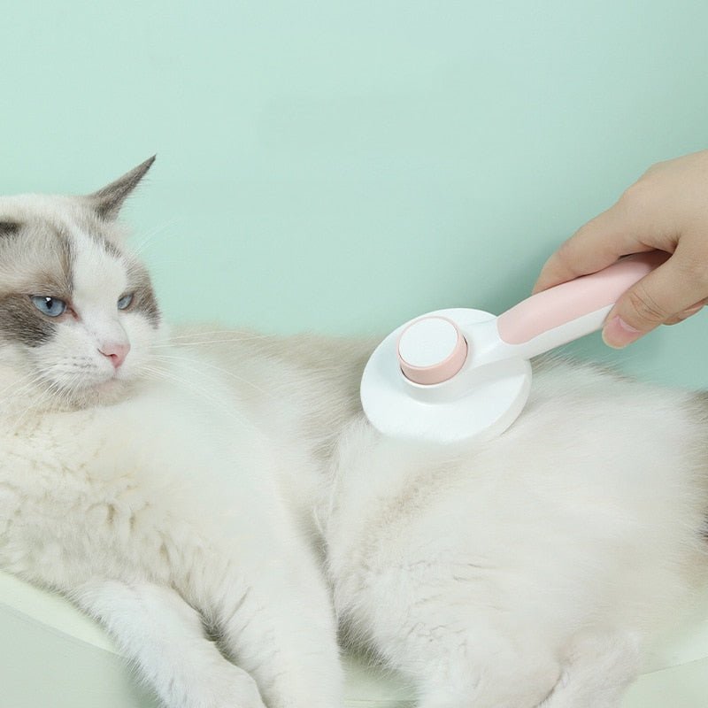 Brosse pour chat  blanc rose