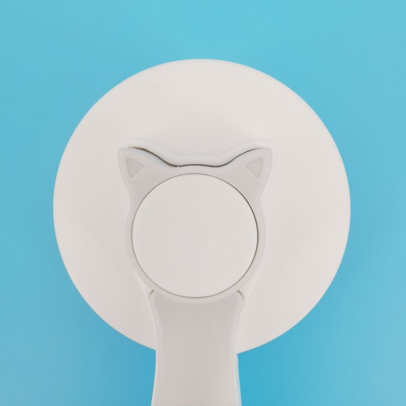 Brosse pour chat  tete de chat