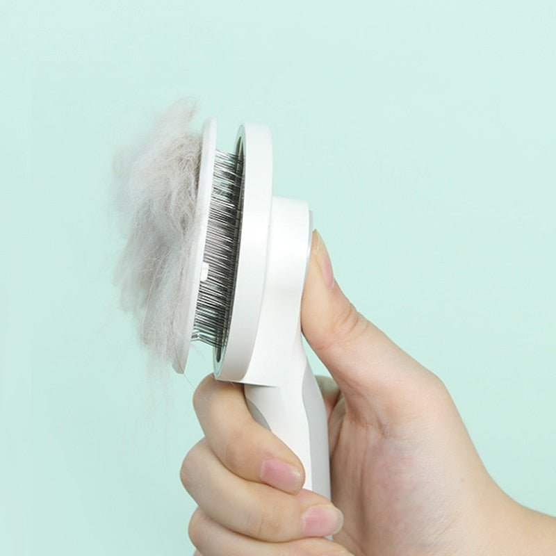 Brosse pour chat blanche